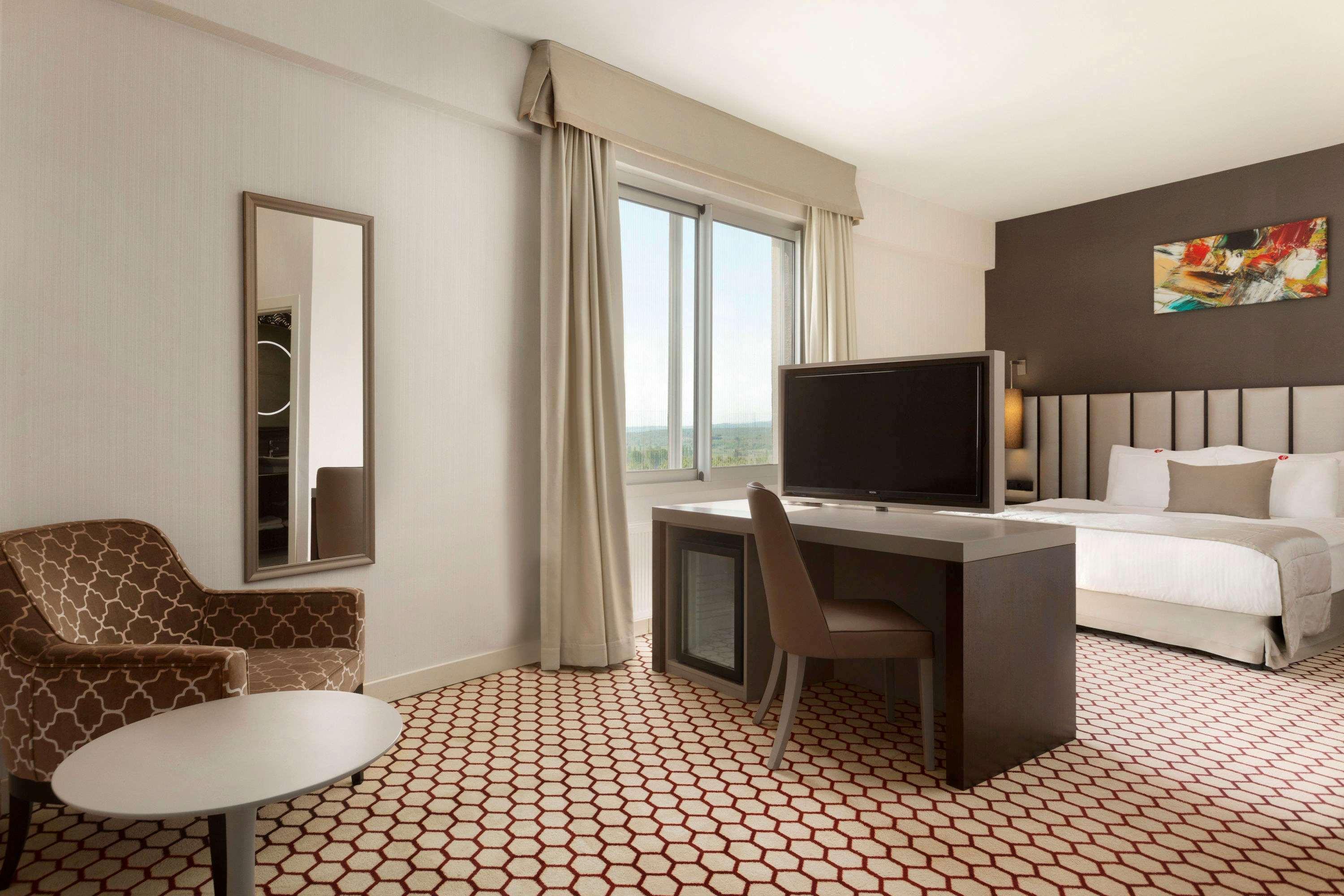 Hotel Ramada By Wyndham Soma Esterno foto