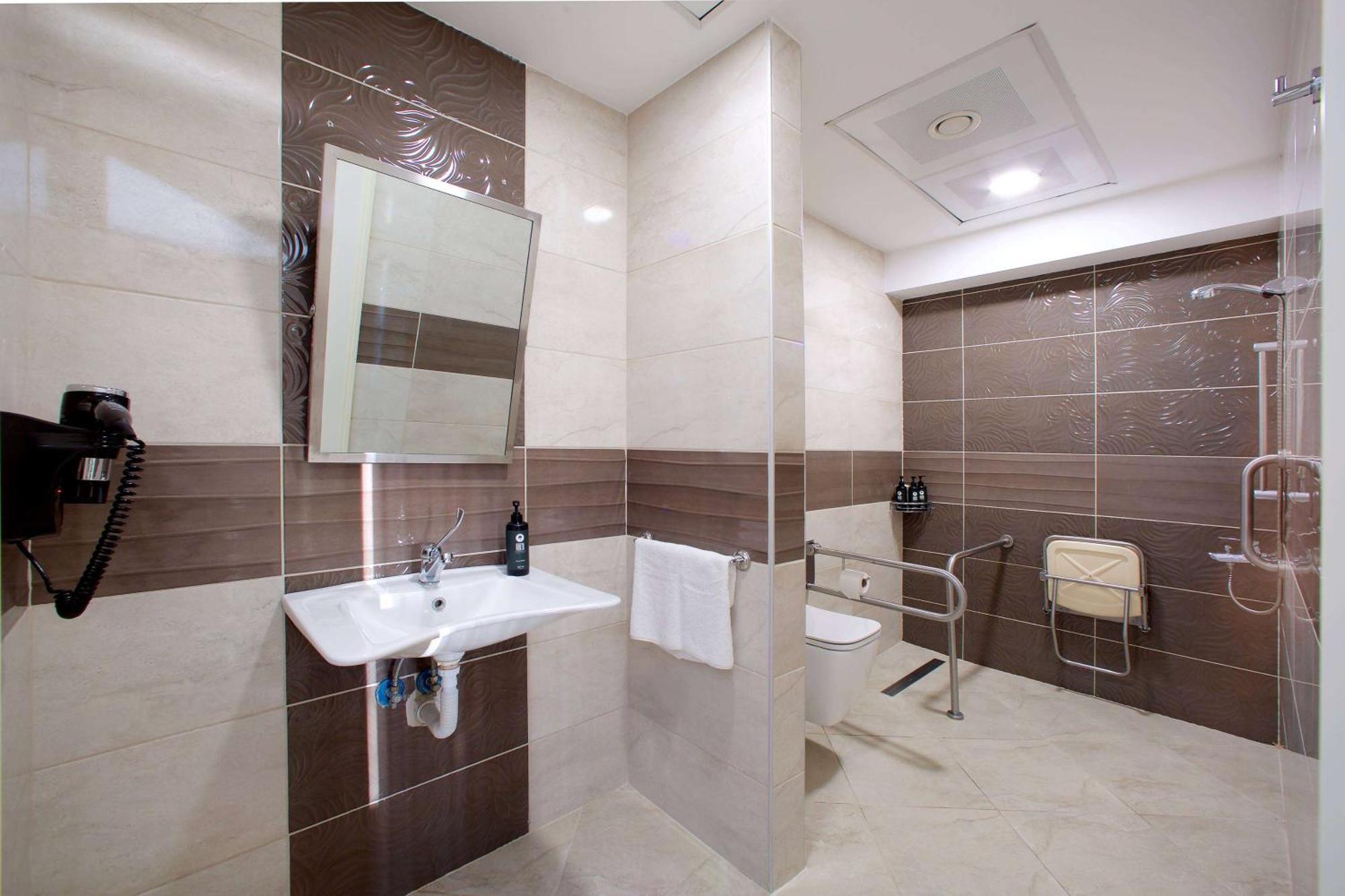 Hotel Ramada By Wyndham Soma Esterno foto