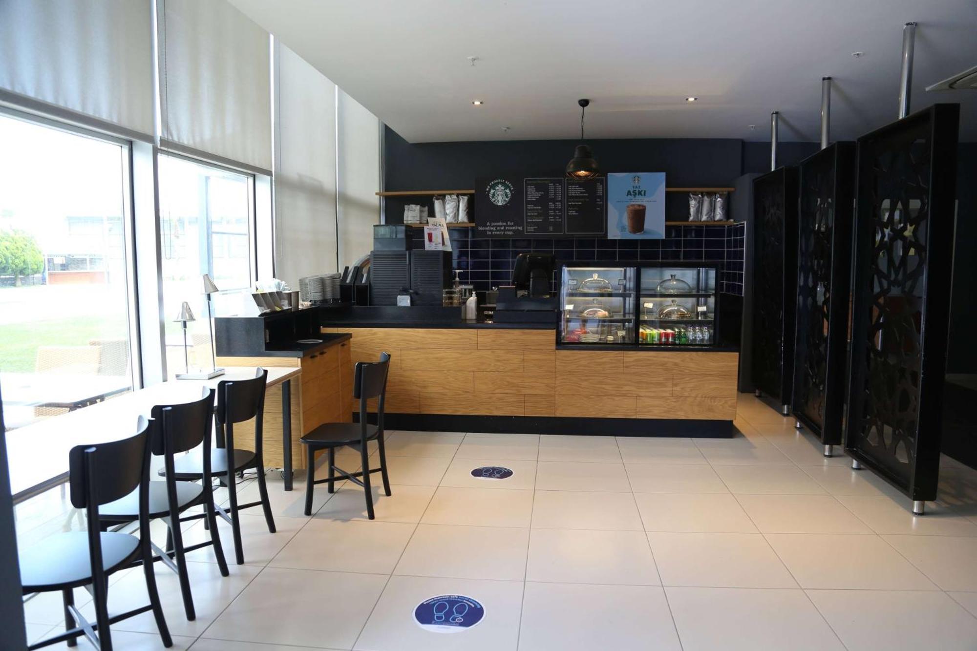 Hotel Ramada By Wyndham Soma Esterno foto