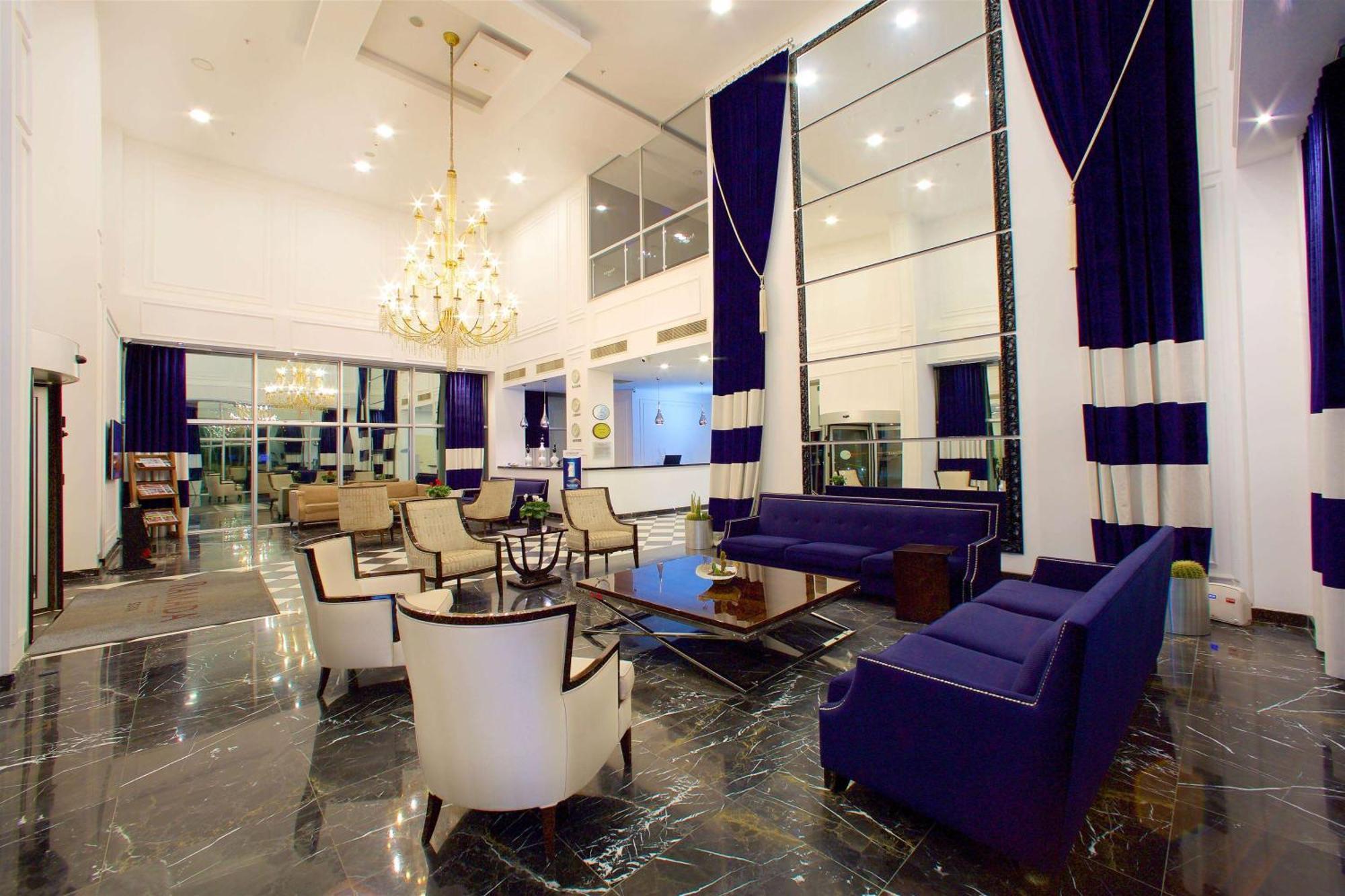 Hotel Ramada By Wyndham Soma Esterno foto